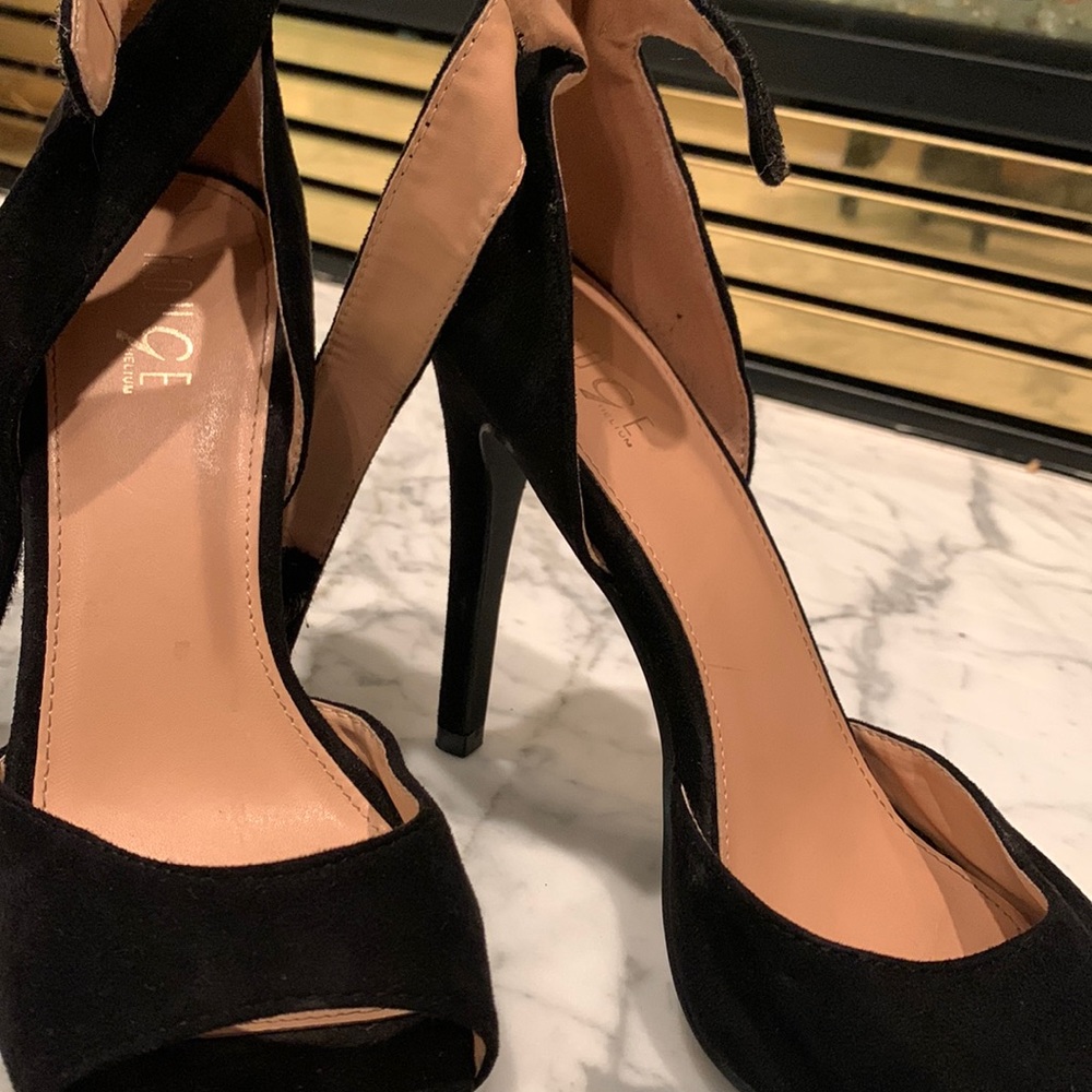 Black heels with a simple strap